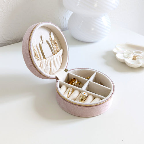 Petite trousse à bijoux de voyage ronde en velours rose