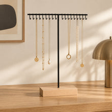Charger l'image dans la galerie, Présentoir à colliers en bois et métal noir socle rectangle sur une commode
